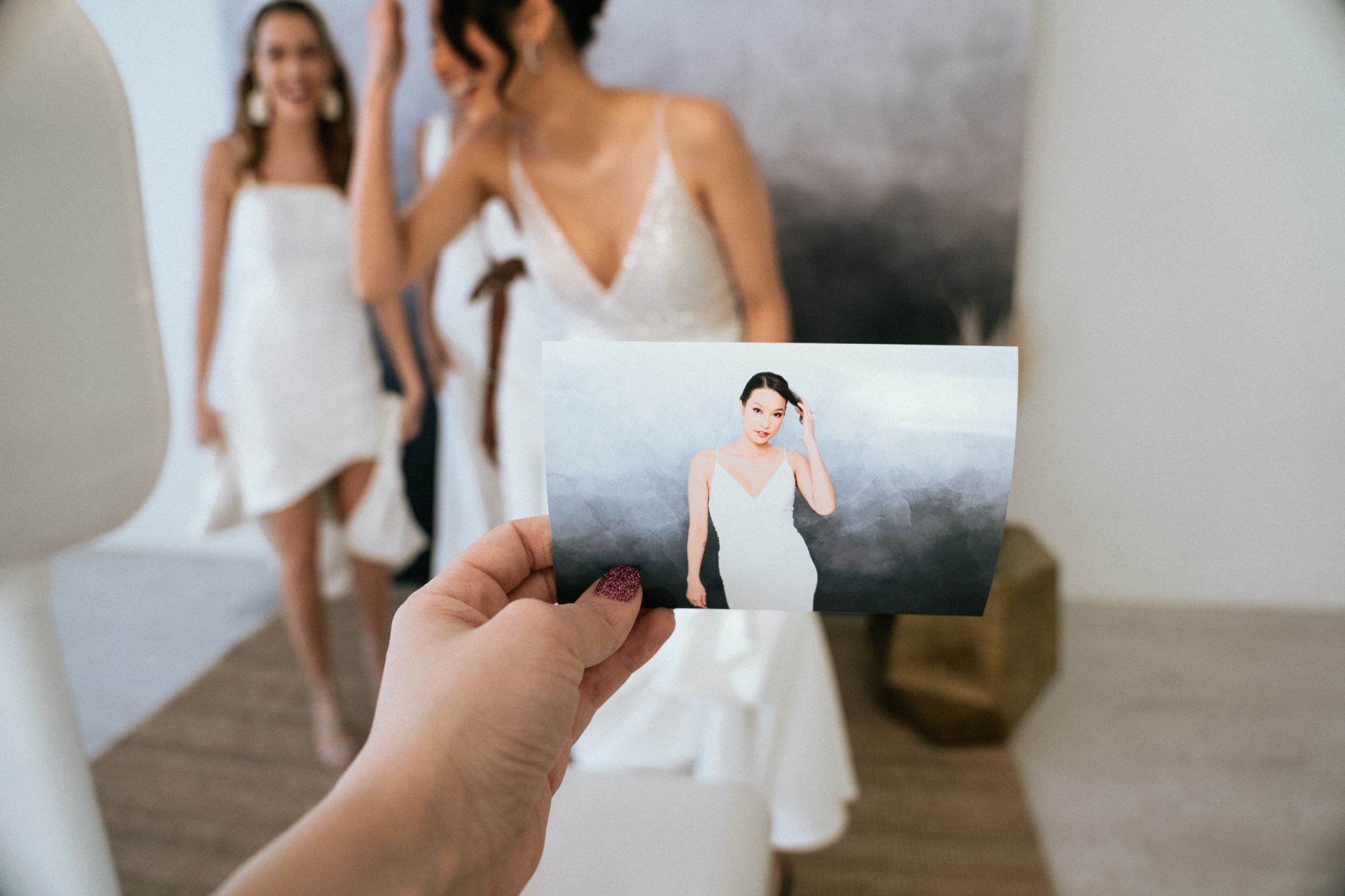 A guest holding a full-size 4 by 6 portrait printed by Photo by KPTZ